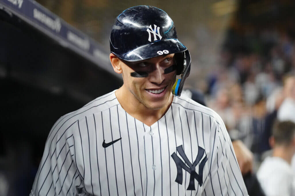 NEW YORK, NY - SEPTEMBER 20: Aaron Judge #99 of the New York Yankees reacts in the dugout after hitting his 60th home run of the season in the ninth inning during the game between the Pittsburgh Pirates and the New York Yankees at Yankee Stadium on Tuesday, September 20, 2022 in New York, New York. (Photo by Daniel Shirey/MLB Photos via Getty Images)