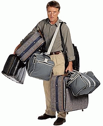man-carrying-luggage.gif