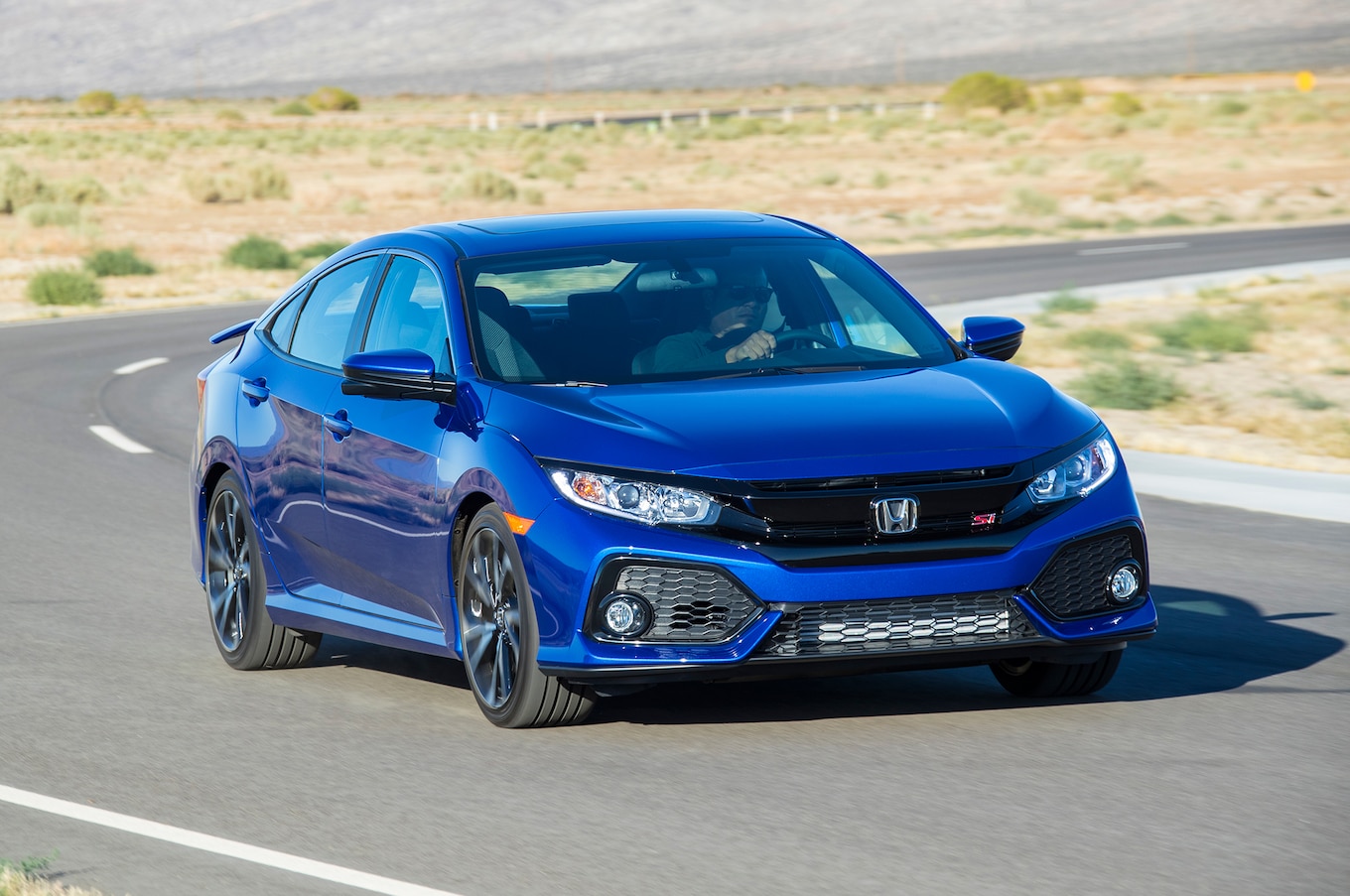 2018-Honda-Civic-front-three-quarter-in-motion.jpg