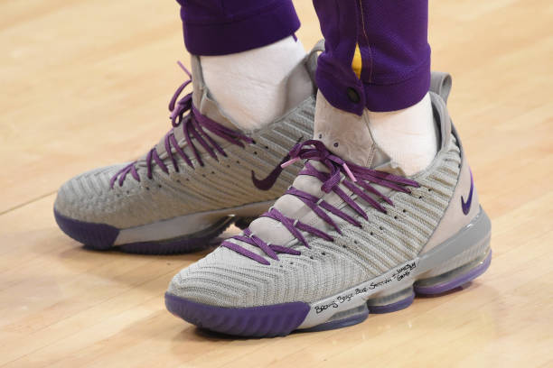 the-sneakers-of-lebron-james-of-the-los-angeles-lakers-are-worn-prior-picture-id1067727104