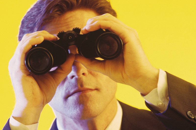 man-with-binoculars-yellow.jpg