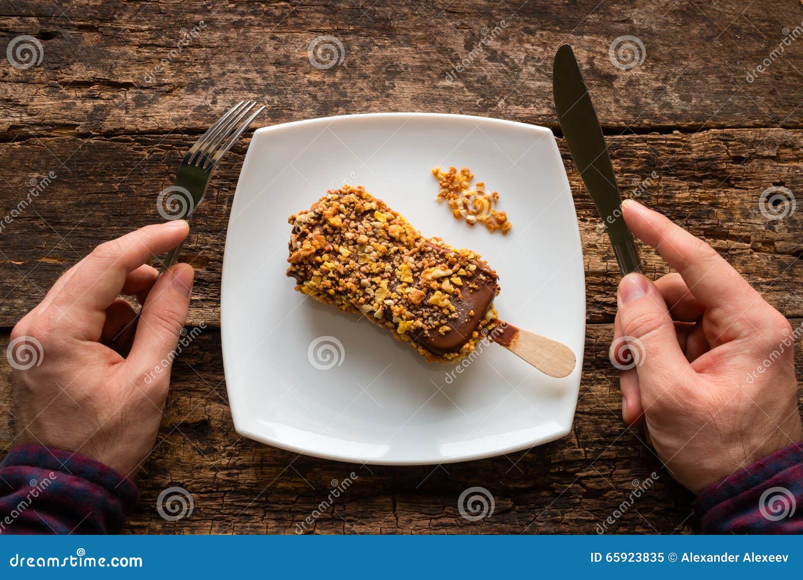 man-knife-fork-to-eat-icecream-ice-cream-65923835.jpg