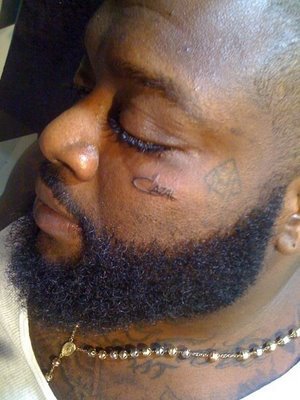 atlnightspotscom-rick-ross-face-tattoo.jpg