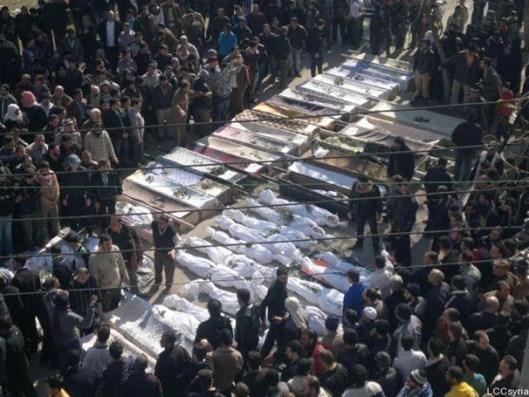 mass-funeral-victims-of-syrian-revolution-by-bashar-al-assad.jpg