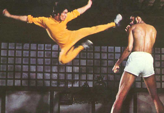 bruce-lee-kareem-flying-kick-dragon.jpg