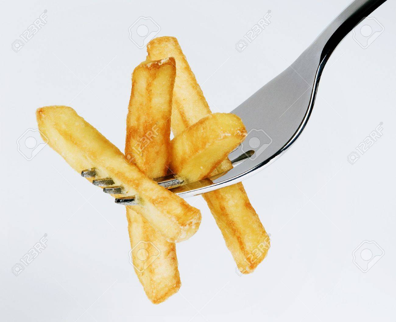 5389635-french-fries-on-a-fork.jpg