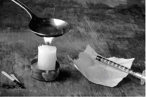 heroin_needle_and_candle.jpg