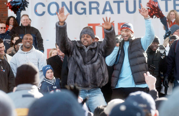 feb-2002-ty-law-of-the-new-england-patriots-waves-to-the-crowd-a-picture-id1496012