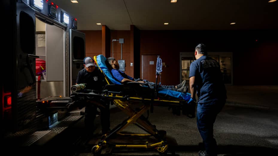 Darwin Varela is carried into the Fort Duncan Regional Medical Center after suffering from dehydration on July 18, 2023 in Eagle Pass, Texas. Darwin fell sick after he and his mother Victoria were found with a group of migrants who recently crossed the Rio Grande river into the United States.  
