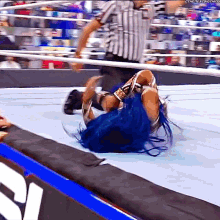 sasha-banks-rolling-out-of-the-ring.gif