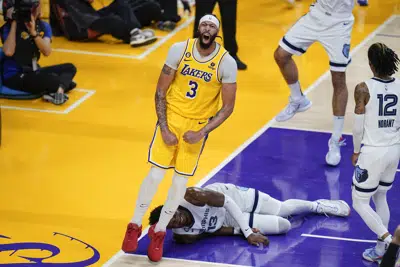 Lakers obliterate Grizzlies 125-85, advance to 2nd round | AP News