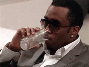Sips Water GIF - Sips Water P Diddy - Discover & Share GIFs