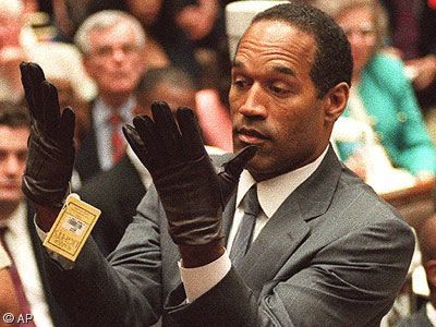 oj-simpson-trying-on-gloves.jpg