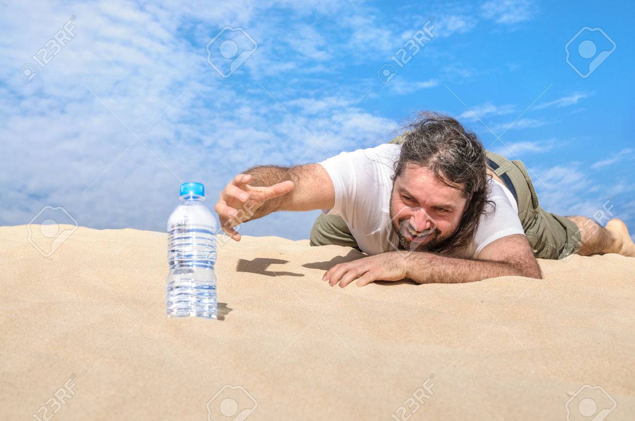 42558662-thirsty-man-in-the-desert-reaches-for-a-bottle-of-pure-water.jpg