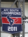 houston-texans-toro-hangs-next-to-the-2011-banner.jpg