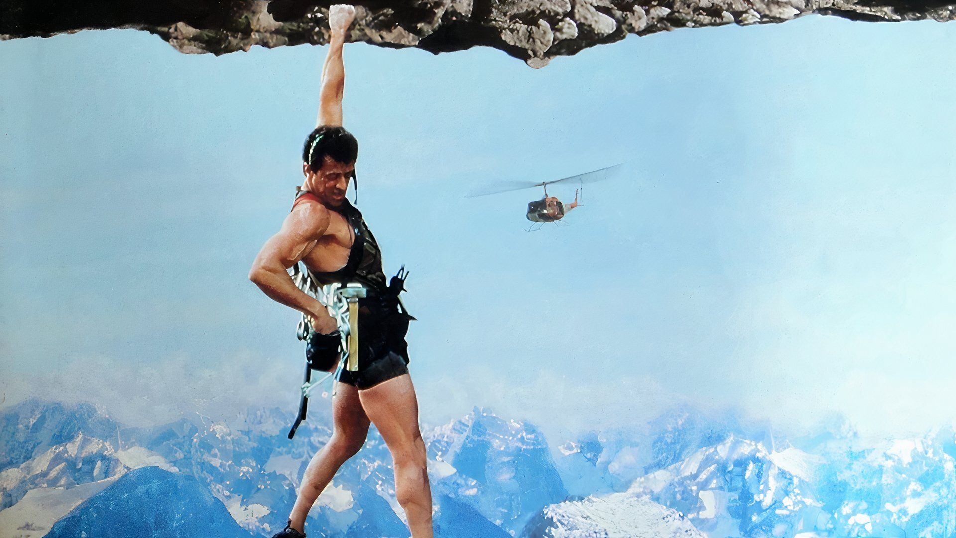 sylvester-stallone-hanging-by-a-rock-in-cliffhanger.jpg