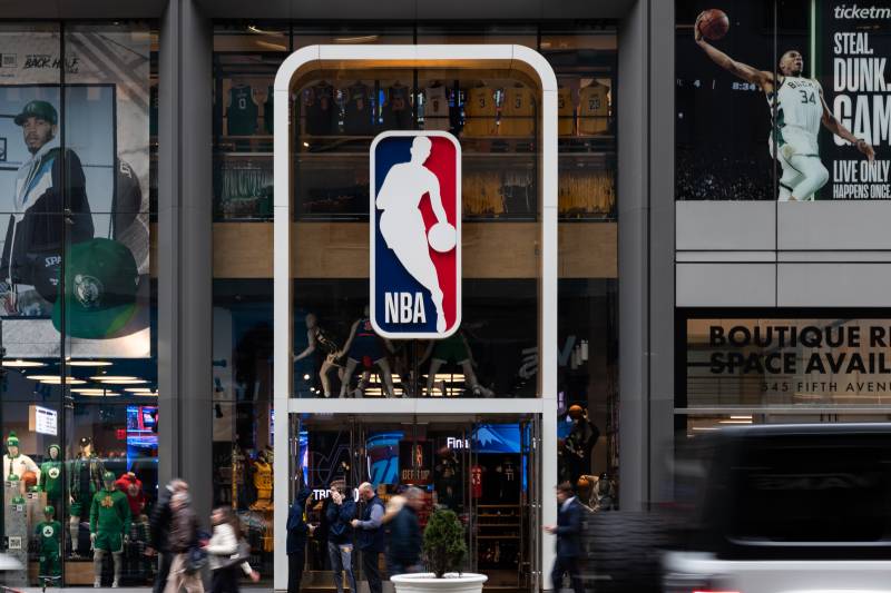 NEW YORK, NY - MARCH 12: An NBA logo is shown at the 5th Avenue NBA store on March 12, 2020 in New York City. The National Basketball Association said they would suspend all games after player Rudy Gobert of the Utah Jazz reportedly tested positive for the coronavirus. (Photo by Jeenah Moon/Getty Images)