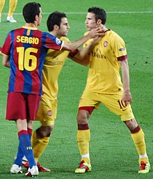 220px-Busquets,_F%C3%A0bregas_%26_Van_Persie.jpg