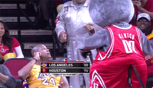 Houston-Rockets-Mascot-Throws-Cake-at-Lakers-Fan-Face.gif