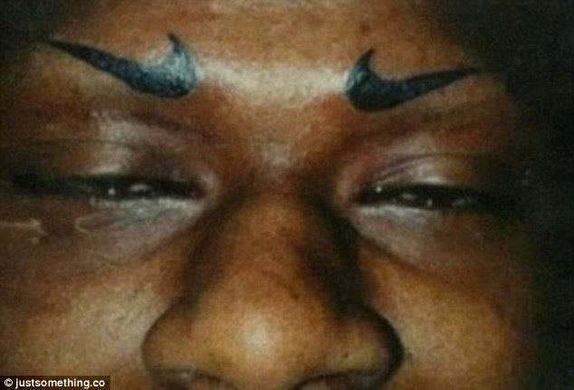 2A8B984700000578-3162111-A_sports_fan_had_Nike_swooshes_tattooed_where_his_eyebrows_ought-a-23_1436959799530.jpg