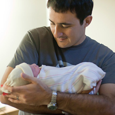 surprising-labor-and-delivery-facts-father-holding-newborn-full.jpg