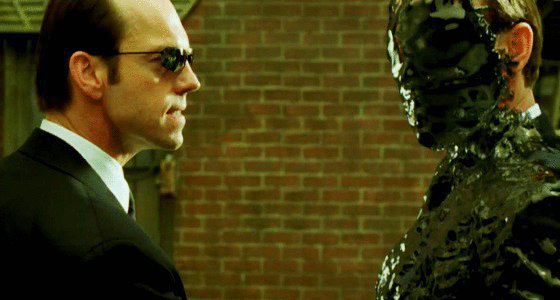 Agent-Smith-in-The-Matrix-Reloaded-agent-smith-22575709-560-300.gif