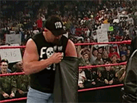 stone-cold-middle-finger-pulls-out-of-bag-WWE-flipped-off-1402848514m.gif