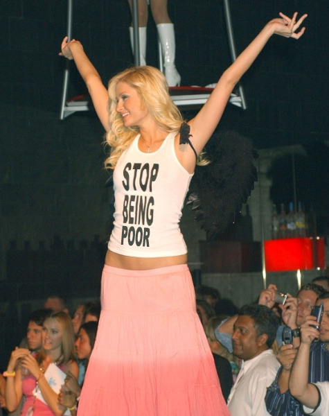Artist Reveals Paris Hilton's Infamous 'Stop Being Poor' Tank Was Fake