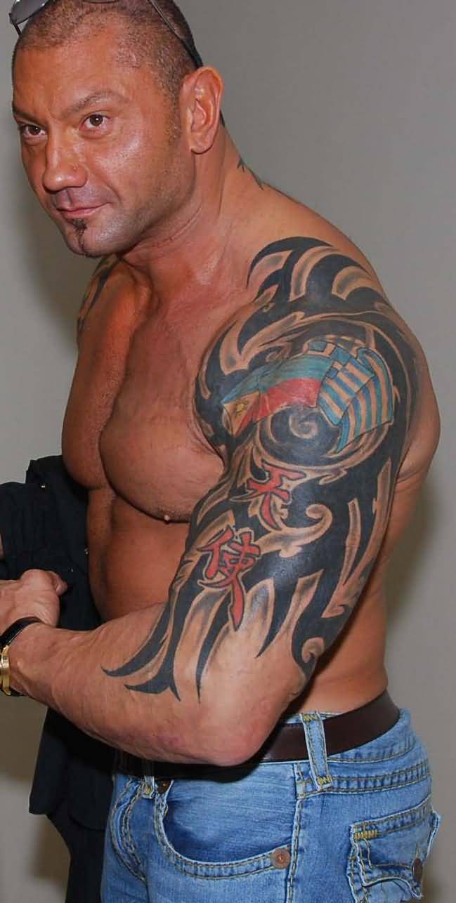 Classic-Tribal-Design-Tattoo-On-WWE-Batista-Left-Half-Sleeve.jpg